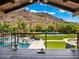 Amazing backyard oasis with a pool, spa, and breathtaking mountain views at 5040 N Arcadia Dr, Phoenix, AZ 85018