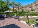 Spacious backyard deck with seating area, umbrella, and mountain views at 5040 N Arcadia Dr, Phoenix, AZ 85018