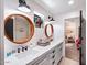 Elegant bathroom boasts double sinks and stylish mirrors at 5040 N Arcadia Dr, Phoenix, AZ 85018