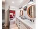 Double vanity bathroom with a view of the bedroom at 5040 N Arcadia Dr, Phoenix, AZ 85018