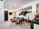 Modern dining area with round table and leather chairs at 5040 N Arcadia Dr, Phoenix, AZ 85018