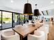 Bright dining area with a large wooden table and modern chairs at 5040 N Arcadia Dr, Phoenix, AZ 85018