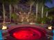 Round hot tub with red lighting nestled in a patio at 5040 N Arcadia Dr, Phoenix, AZ 85018