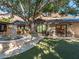 Relaxing patio with fountain and lush landscaping at 5040 N Arcadia Dr, Phoenix, AZ 85018