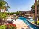 Resort-style pool with spa, fountains, and lounge chairs at 5040 N Arcadia Dr, Phoenix, AZ 85018