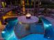 Luxury pool area with fire pit and fountain features at 5040 N Arcadia Dr, Phoenix, AZ 85018