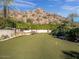 Landscaped backyard putting green at 5040 N Arcadia Dr, Phoenix, AZ 85018