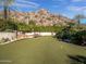 Landscaped putting green with mountain views at 5040 N Arcadia Dr, Phoenix, AZ 85018