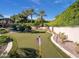 Landscaped putting green with American flag at 5040 N Arcadia Dr, Phoenix, AZ 85018