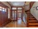 Grand entryway with hardwood floors and a staircase leading upstairs at 522 W Roosevelt St, Phoenix, AZ 85003