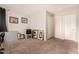 Cozy bedroom featuring carpet and decorative walls at 6538 W Nez Perce St, Phoenix, AZ 85043