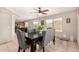 Dining room with dark wood table and gray chairs at 6538 W Nez Perce St, Phoenix, AZ 85043