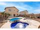 Relaxing backyard with a refreshing pool and spa at 6538 W Nez Perce St, Phoenix, AZ 85043