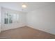 Bright bedroom with neutral walls and carpet flooring at 7687 E Wing Shadow Rd, Scottsdale, AZ 85255