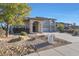 Stunning curb appeal! Two story home with attached garage and front yard landscaping at 7687 E Wing Shadow Rd, Scottsdale, AZ 85255