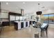 Modern kitchen boasts stainless steel appliances and an island at 7687 E Wing Shadow Rd, Scottsdale, AZ 85255