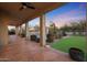 Covered patio with view of pool and backyard at 7687 E Wing Shadow Rd, Scottsdale, AZ 85255