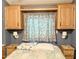 Bedroom with a double bed and decorative curtains at 7750 E Broadway Rd # 232, Mesa, AZ 85208