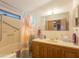 Clean bathroom with a shower/tub combo and vanity at 8600 E Broadway Rd # 91, Mesa, AZ 85207