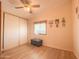 Simple bedroom with light flooring and large closet at 8600 E Broadway Rd # 91, Mesa, AZ 85207