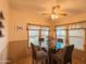 Bright dining area with a glass table and four chairs at 8600 E Broadway Ave # 91, Mesa, AZ 85207