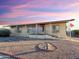 Front view of manufactured home with landscaping at 8600 E Broadway Ave # 91, Mesa, AZ 85207