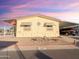 Single-wide manufactured home with carport at 8600 E Broadway Rd # 91, Mesa, AZ 85207