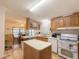 Kitchen with island and ample cabinetry at 8600 E Broadway Rd # 91, Mesa, AZ 85207