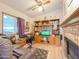 Living room with fireplace and built-in shelving at 8600 E Broadway Rd # 91, Mesa, AZ 85207