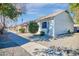 Attractive exterior of a condo building with a walkway and landscaping at 8901 W Loma Ln, Peoria, AZ 85345