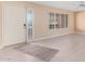 Bright entryway with tile flooring and neutral walls at 910 S Portland Cir, Mesa, AZ 85206