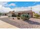 Brick ranch house with cactus landscaping and two-car garage at 910 S Portland Cir, Mesa, AZ 85206