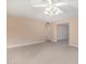 Spacious living room with tile flooring and ceiling fan at 910 S Portland Cir, Mesa, AZ 85206