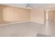 Bright living room with tile flooring and ceiling fan at 910 S Portland Cir, Mesa, AZ 85206