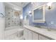 Clean bathroom with marble tile, updated vanity, and tranquil color scheme at 9108 N Fireridge Trl, Fountain Hills, AZ 85268