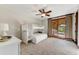 Well-lit bedroom with bunk beds and patio access at 9108 N Fireridge Trl, Fountain Hills, AZ 85268