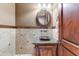 Powder room with granite vanity and tiled walls at 9108 N Fireridge Trl, Fountain Hills, AZ 85268