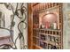 Well-stocked wine cellar with ample storage for wine and spirits at 9108 N Fireridge Trl, Fountain Hills, AZ 85268