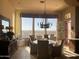 Breakfast nook with scenic views and a large chandelier at 9697 E Preserve Way, Scottsdale, AZ 85262