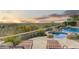 Stunning pool and spa with mountain views and comfortable lounge chairs at 9697 E Preserve Way, Scottsdale, AZ 85262