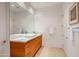 Modern bathroom with double vanity and marble countertop at 9821 E Sundance Trl, Scottsdale, AZ 85262