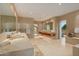 Spa-like bathroom with double vanities and large mirror at 9821 E Sundance Trl, Scottsdale, AZ 85262