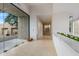 Bright entryway with glass doors and marble accents at 9821 E Sundance Trl, Scottsdale, AZ 85262