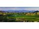 Scenic golf course with panoramic mountain views and lush fairways at 9821 E Sundance Trl, Scottsdale, AZ 85262