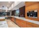 Modern kitchen with marble countertops and built-in espresso machine at 9821 E Sundance Trl, Scottsdale, AZ 85262