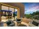 Outdoor patio with fire pit and comfortable seating at 9821 E Sundance Trl, Scottsdale, AZ 85262