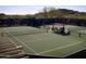 Two well-maintained tennis courts with surrounding fencing at 9821 E Sundance Trl, Scottsdale, AZ 85262