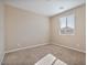 Bright bedroom with neutral walls and carpet at 9925 E Orange Grove St, Florence, AZ 85132