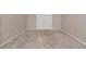 Empty bedroom featuring neutral walls and carpet at 9925 E Orange Grove St, Florence, AZ 85132