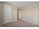 Spacious bedroom with neutral walls and carpeted floors at 9925 E Orange Grove St, Florence, AZ 85132